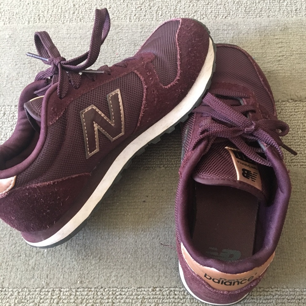 Burgundy and rose gold New Balance 311 sneakers